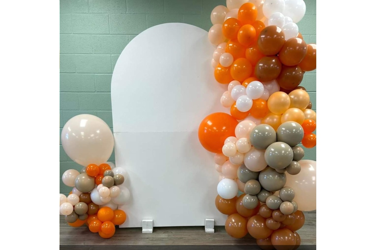 Petals and Parties back drop and basic balloon arch Auction to Save